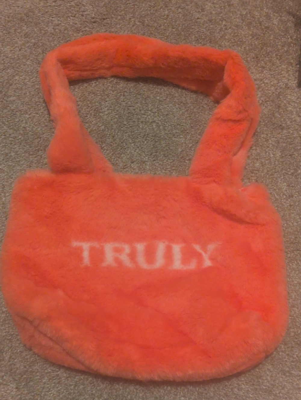 TRULY Organic Beauty Coral Red Faux Fur Shoulder Bag with White Logo